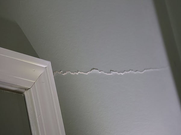 crack by door frame