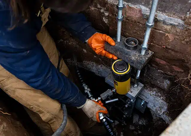 man working on foundation pier